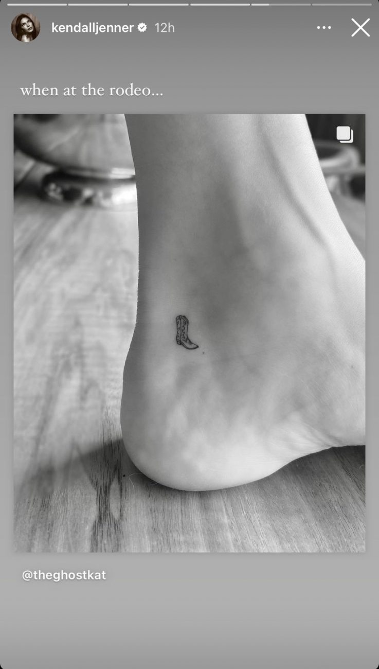 A black and white photo of Kendall Jenner's ankle with a very small tattoo of a cowboy boot.
