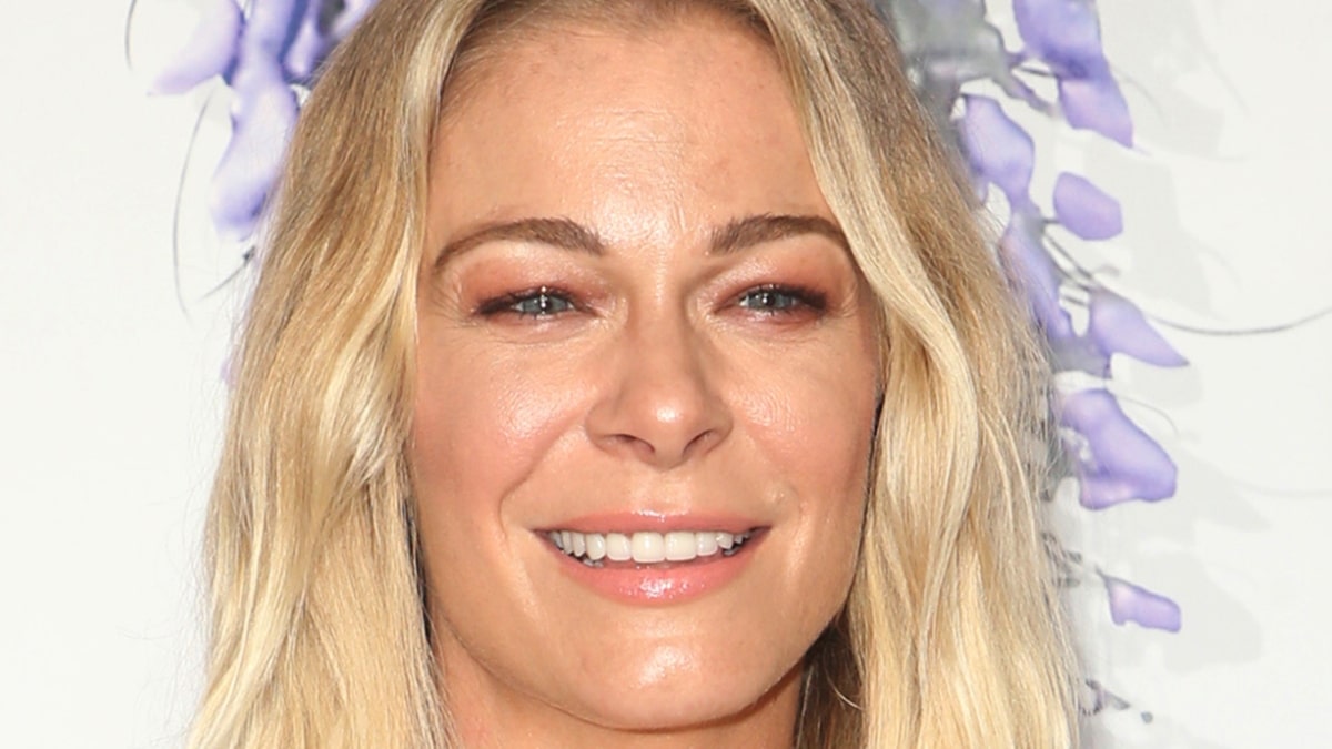 LeAnn Rimes seems slot in a white crop high and tight pants after leaving the salon