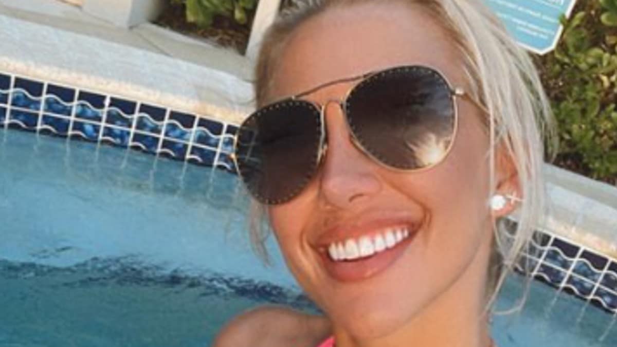 Savannah Chrisley in bikini jokes in pool with finest good friend