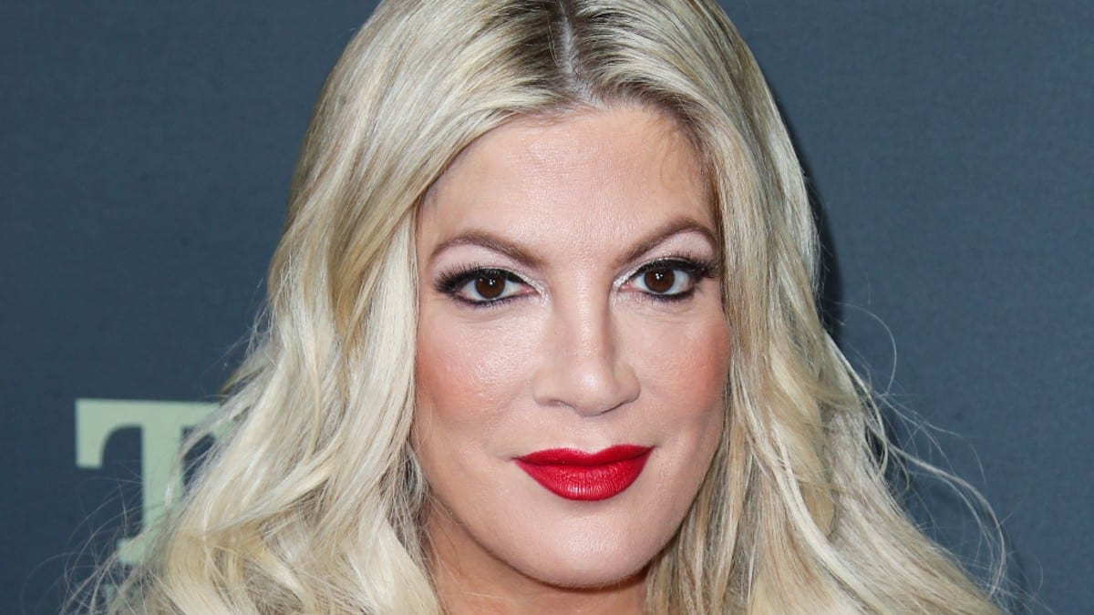 Tori Spelling has 20-year-old breast implants changed