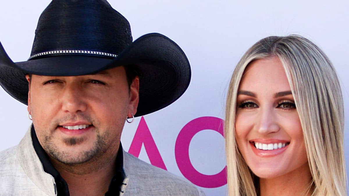Jason and Brittany Aldean pose on the red carpet