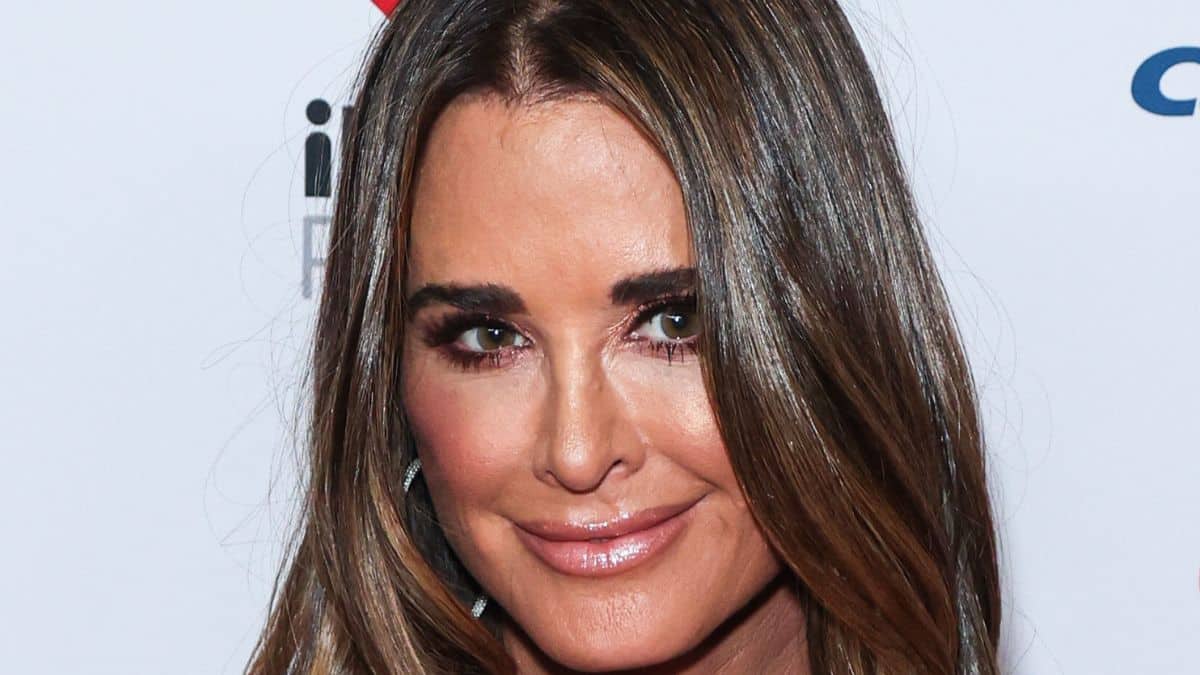 RHOBH star Kyle Richards walked the red carpet at the iHeart Radio Music Festival in a busty mini dress.