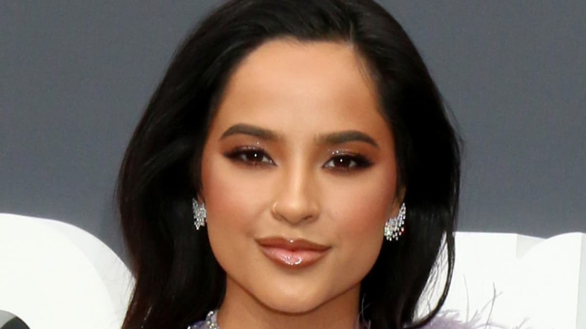 Becky G wows in neon inexperienced cutout costume