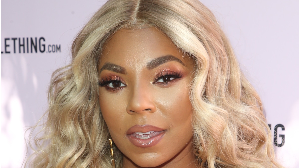 Ashanti with blonde hair in the feature image