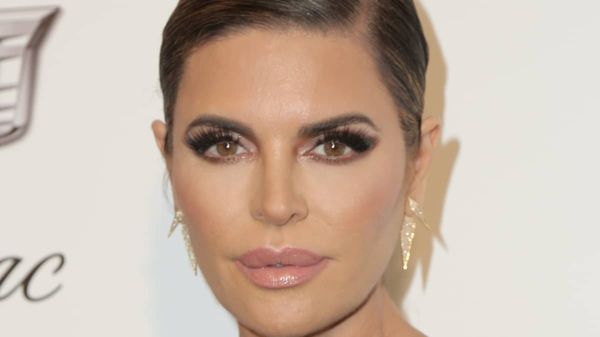 Lisa Rinna teases fans with news to come about her business.