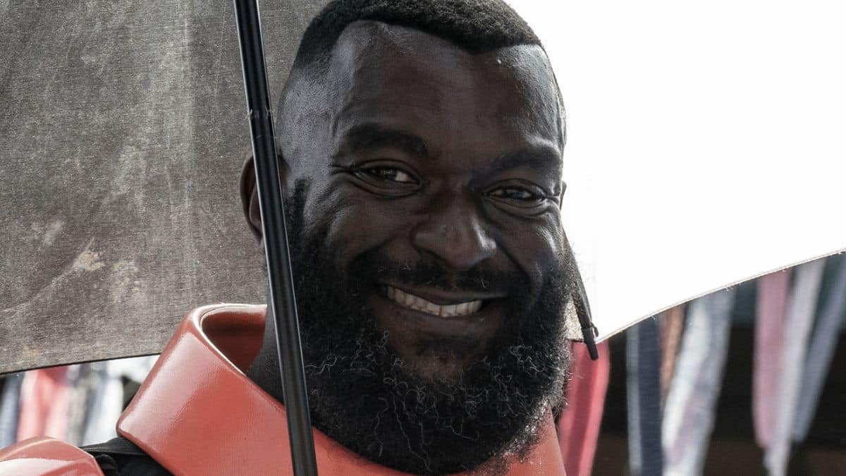 Michael James Shaw stars as Mercer, as seen in a behind-the-scenes shot for Episode 16 of AMC's The Walking Dead Season 11