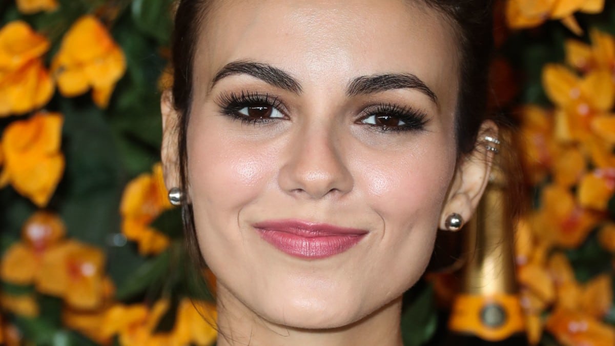 A close up of Victoria Justice smiling