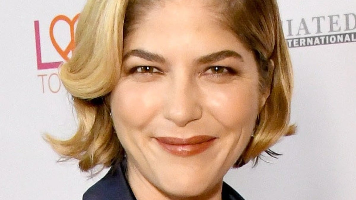 Selma Blair warms up for Dancing with the Stars by stretching in her ‘blissful room’