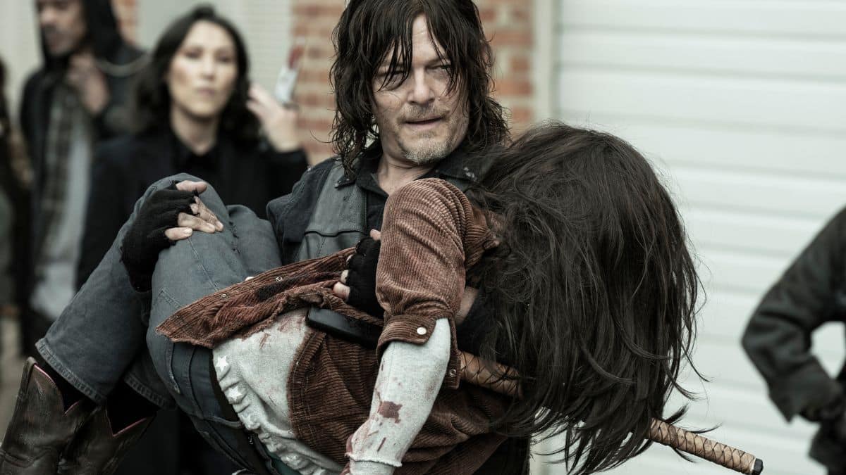 Norman Reedus as Daryl Dixon and Cailey Fleming as Judith Grimes, as seen in Episode 23 of AMC's The Walking Dead Season 11