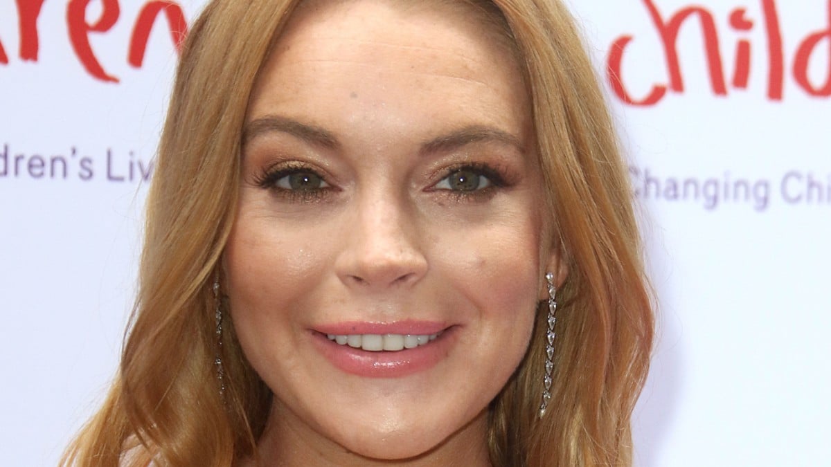 Lindsay Lohan poses on the red carpet.