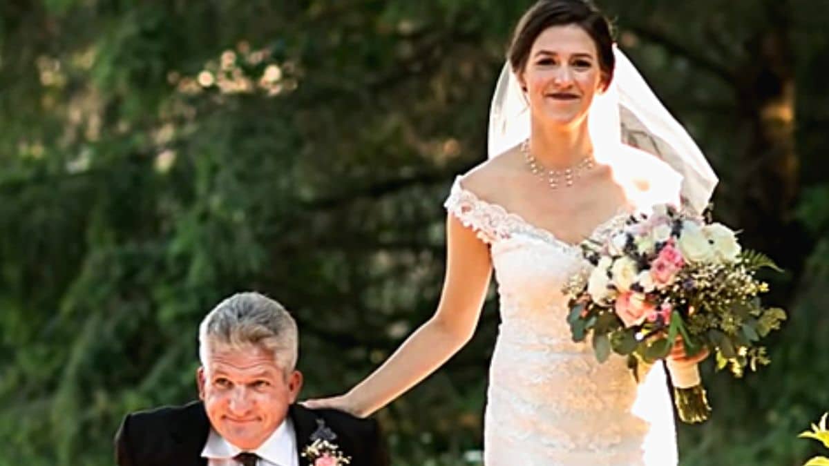 matt roloff walks his daughter molly roloff down the aisle for her wedding at roloff farms