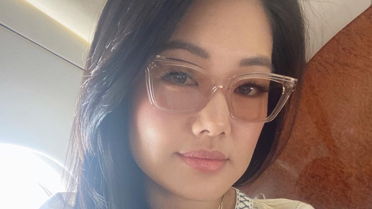 Crystal Kung Minkoff takes a selfie in glasses.