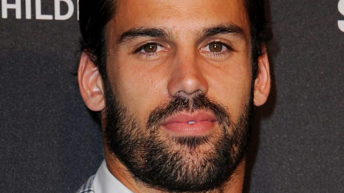 Eric Decker poses on the red carpet