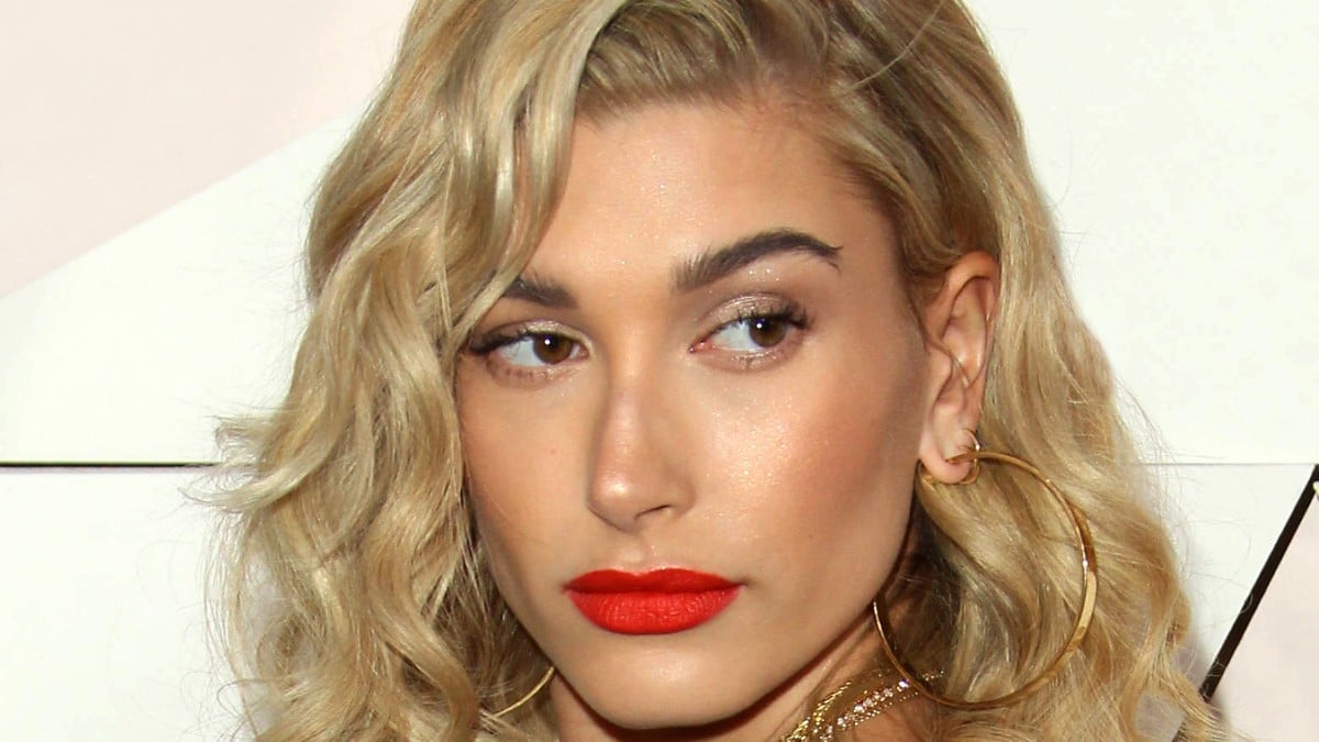 Hailey Bieber gets a little cheeky for 'lost submission' photos.