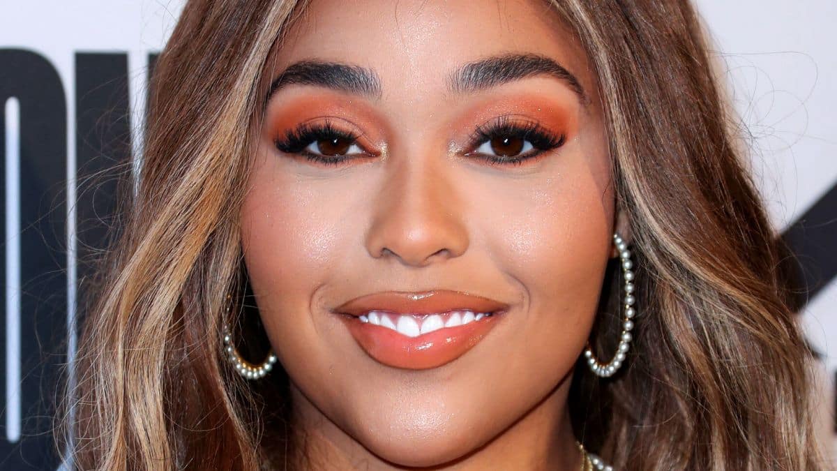 Jordyn Woods strikes a pose on the red carpet at the UOMA Beauty Summer Party