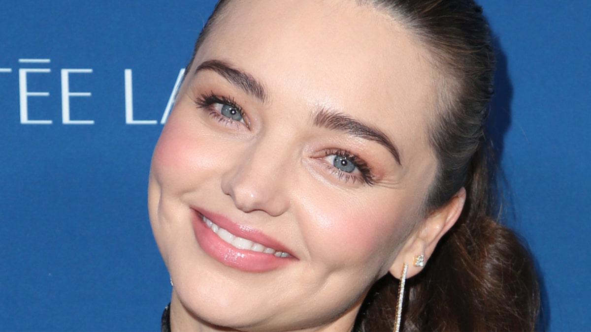 Miranda Kerr stuns in mesh swim cowl for a contented weekend