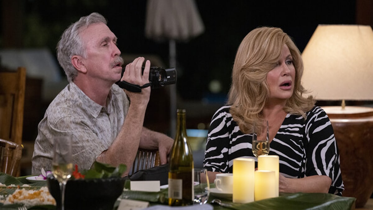Steve Coulter as Larry Fowler and Jennifer Coolidge as Carol Fowler in in the Prime Video movie, Shotgun Wedding.
