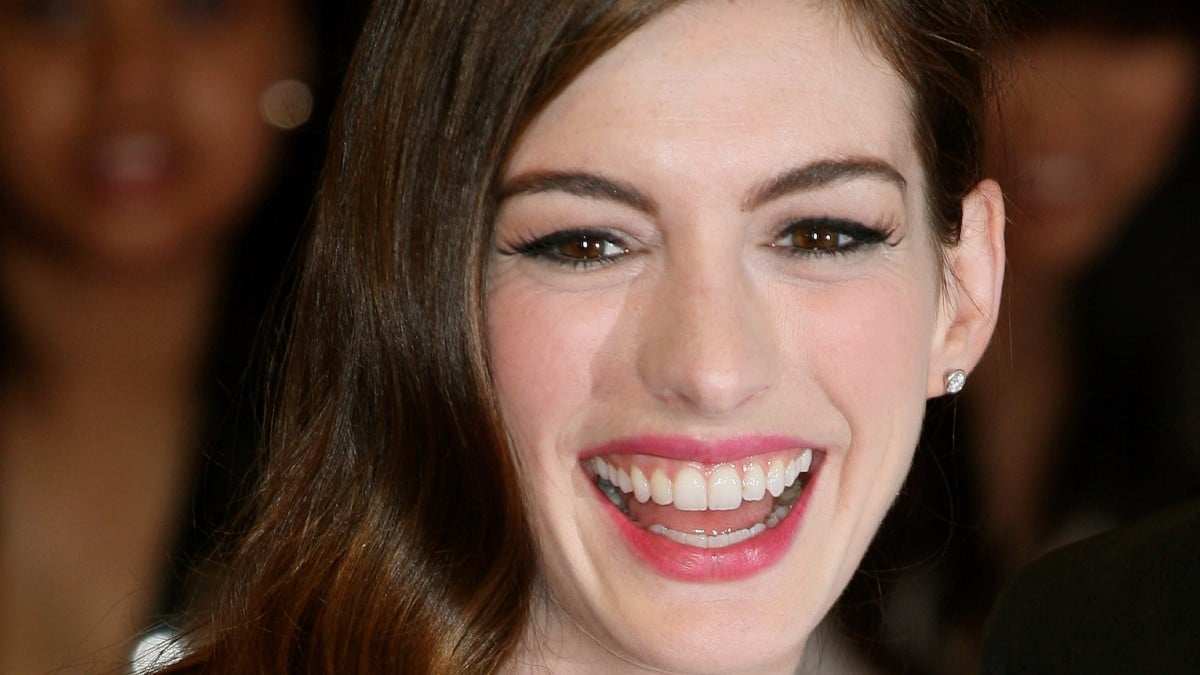 Anne Hathaway smiling for the camera