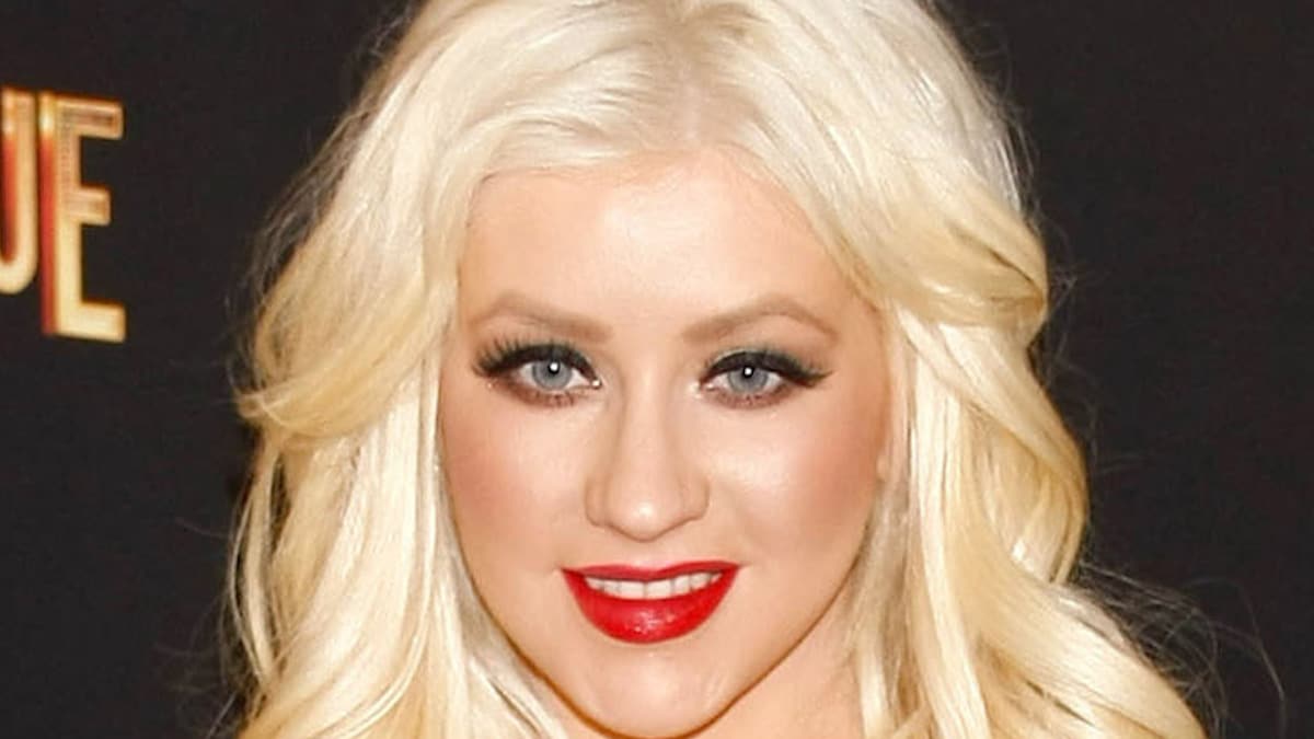 Christina Aguilera in white bikini shares 2022 highlights