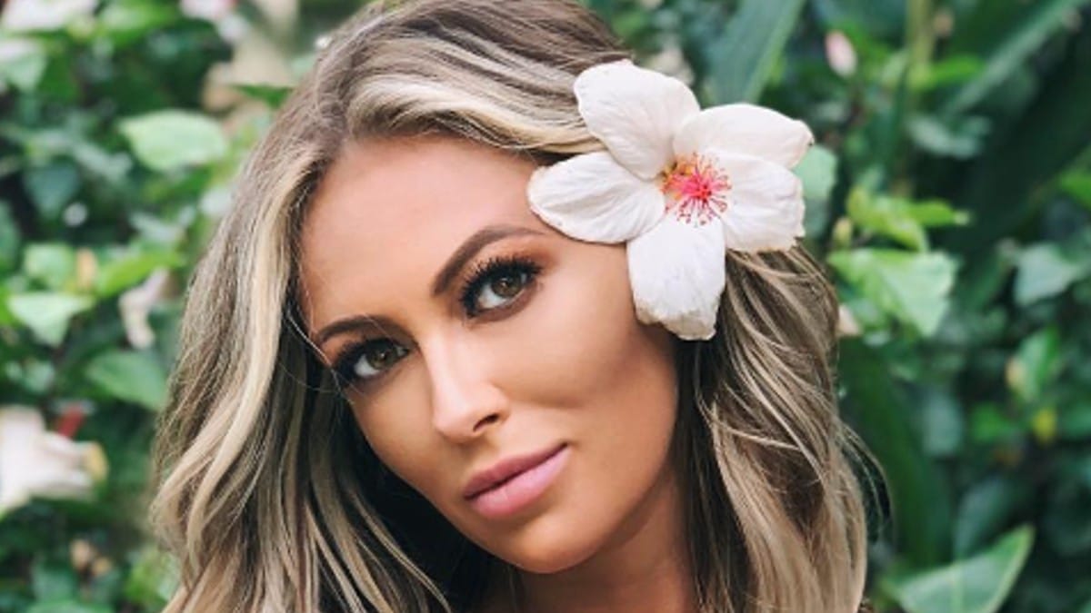 Paulina Getzky poses with a flower in her hair.