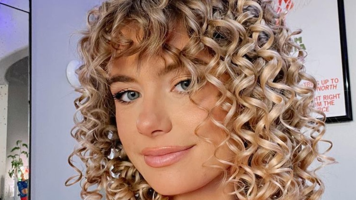Demi Burnett with curly hair