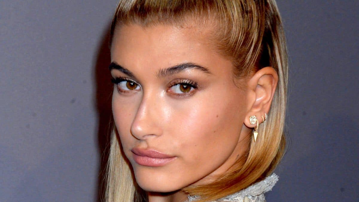 Hailey Bieber stuns in corset high for lavatory selfie