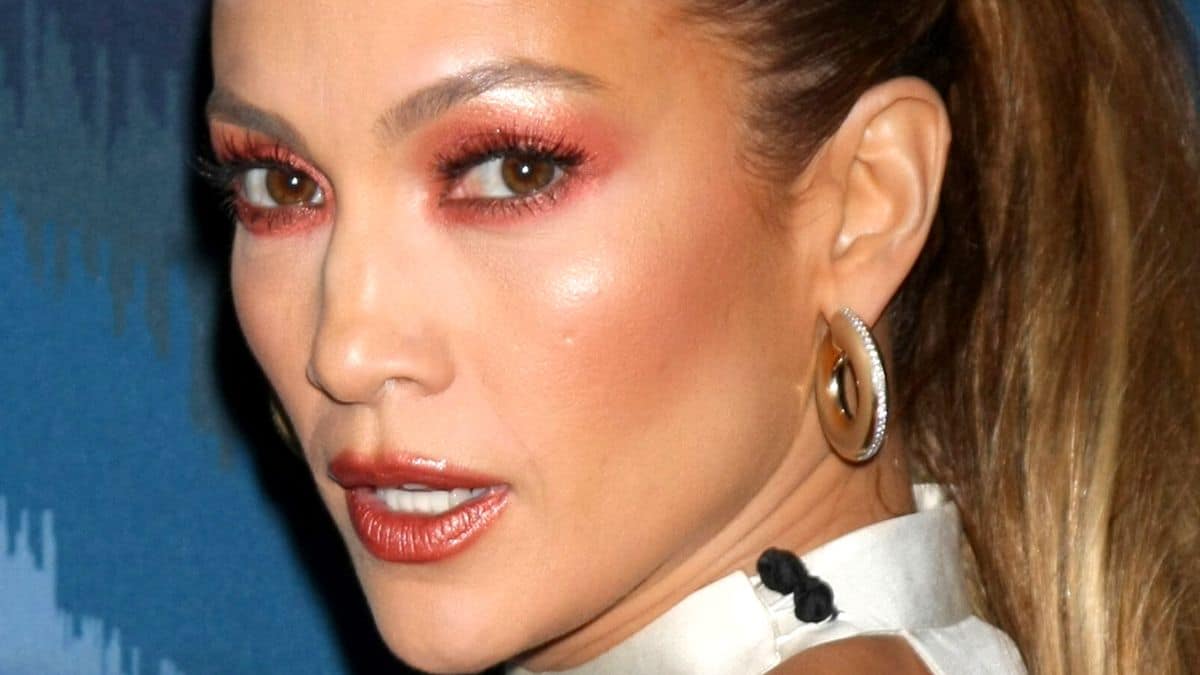Jennifer Lopez flashes cleavage in plunging robe for Grammys