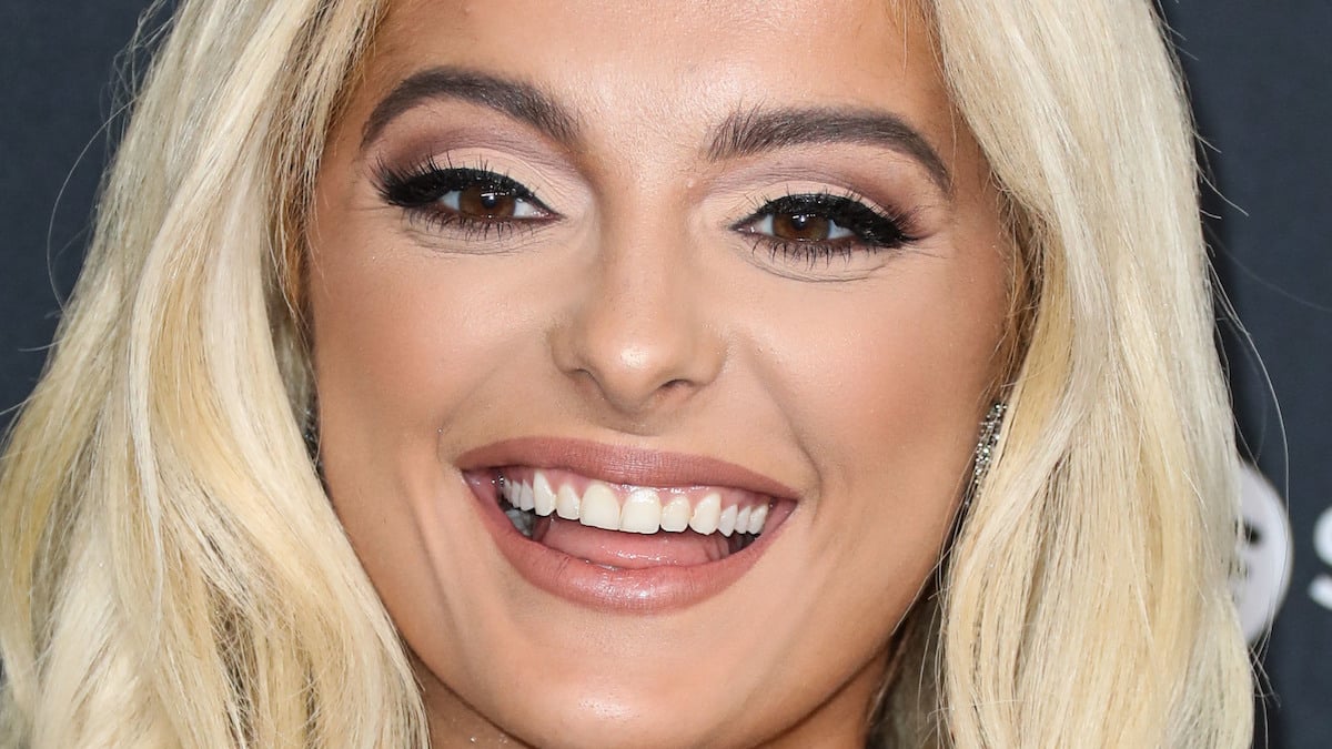 Bebe Rexha smiling on the red carpet