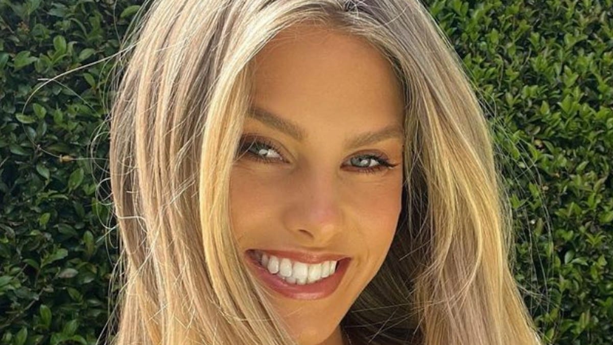 Natalie Roser sizzles in lace for wine and cheese extravaganza