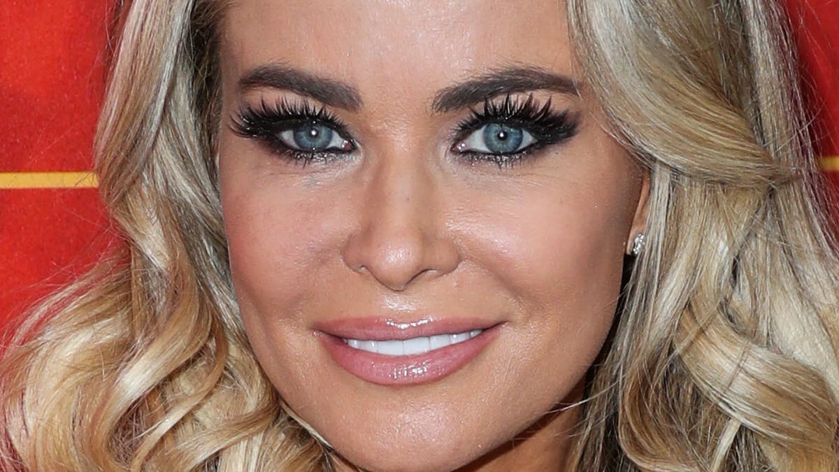 Carmen Electra dazzles in glowing and sheer lingerie