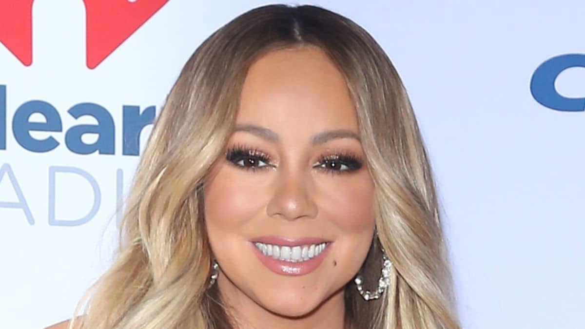 Mariah Carey smiling on the red carpet