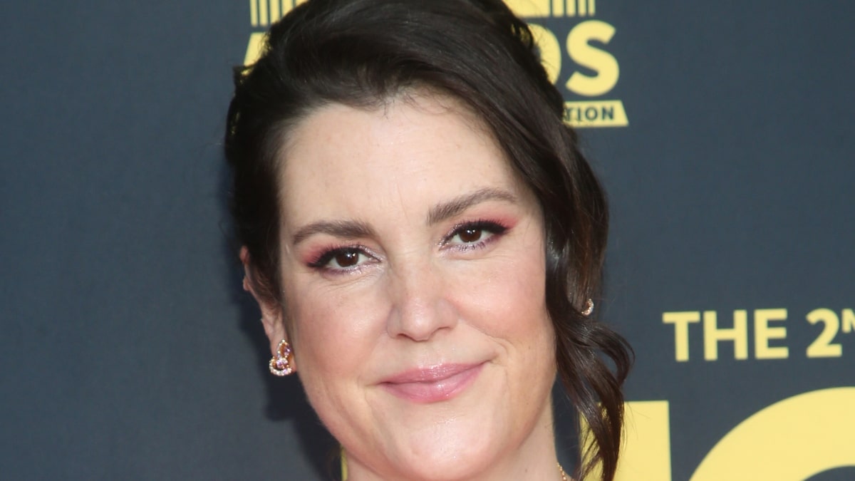A close up of Melanie Lynskey's face on the red carpet
