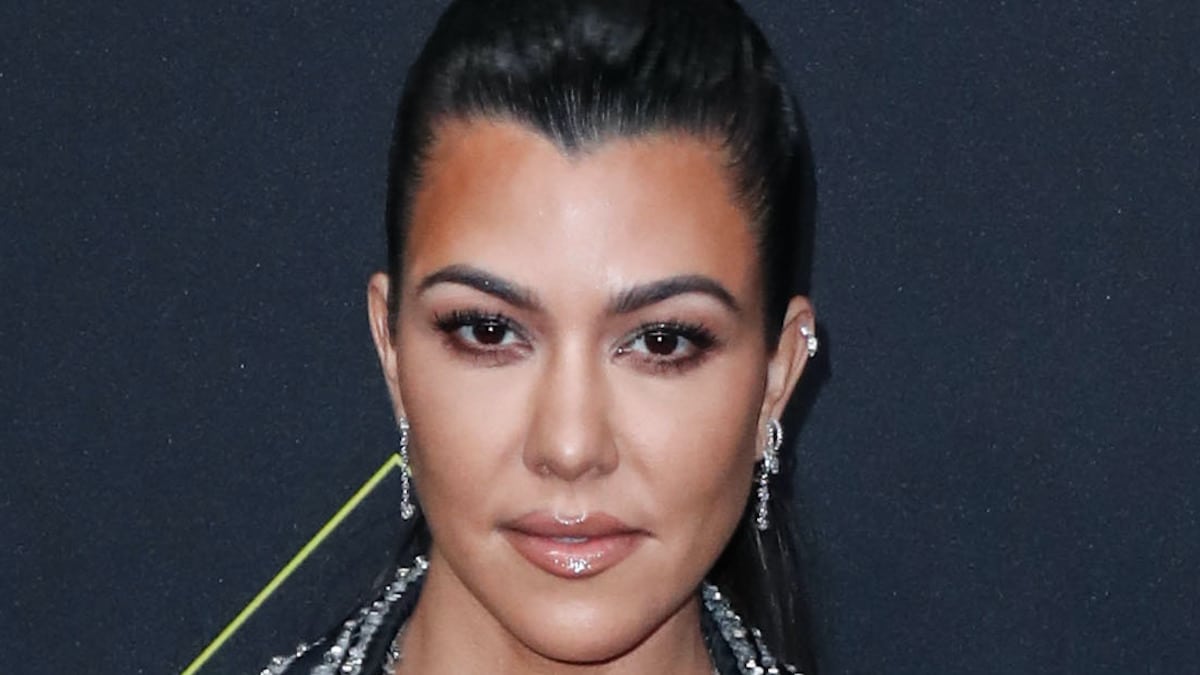Kourtney Kardashian flaunts baby bump in skimpy swimsuits for summer fun