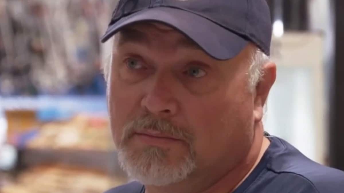 Doug Crowell looks surprised as he learns about an artifact on Oak Island