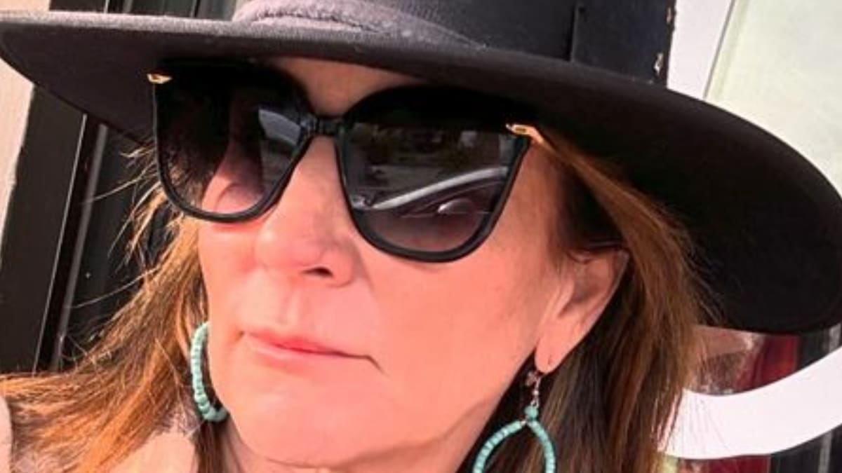 Faith Martin shares a selfie wearing sunglasses and a hat