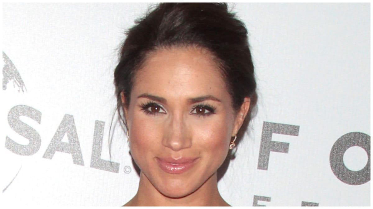 Meghan Markle smiles for the camera