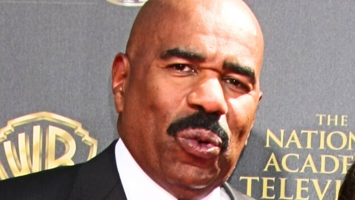 steve harvey poses for photographers at the Daytime Emmy Awards
